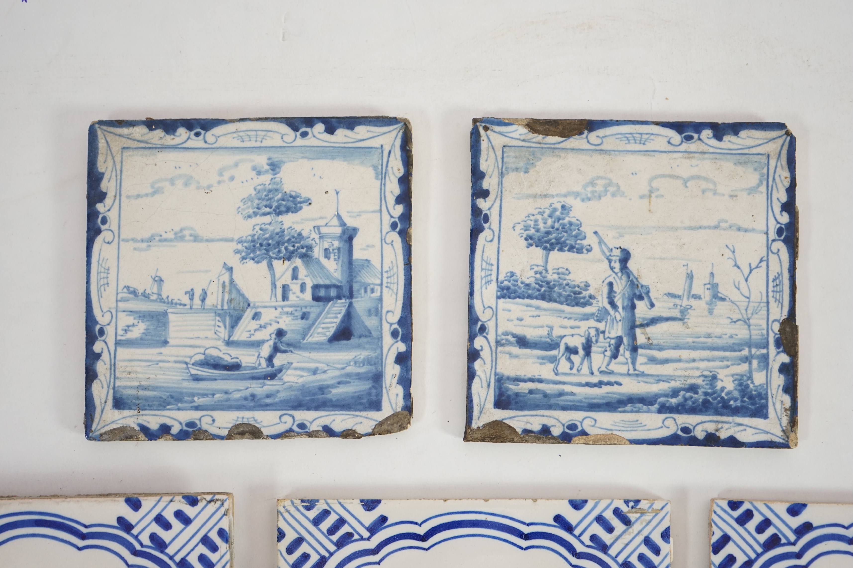 A pair of 18th century Delft blue and white tiles